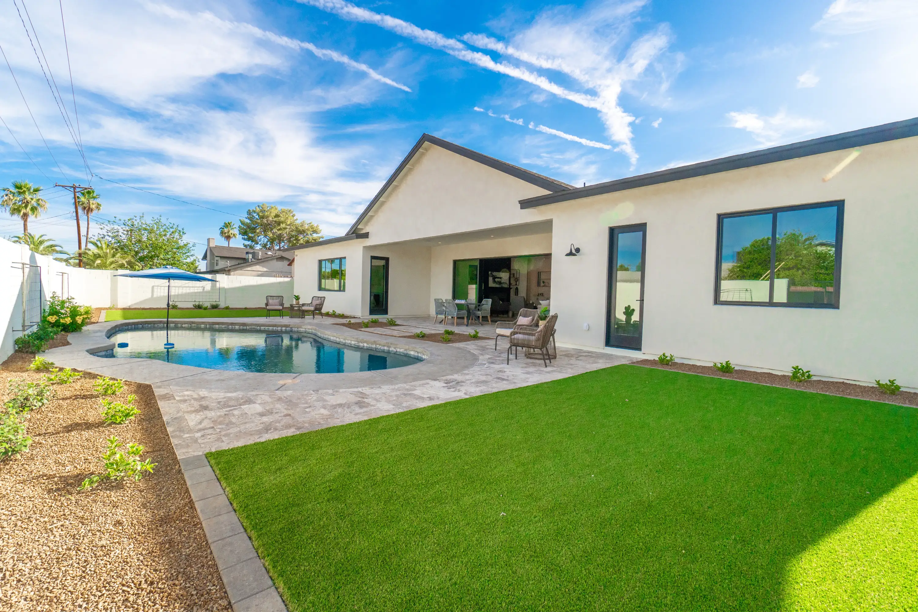 Poolside lawn and hardscape care project